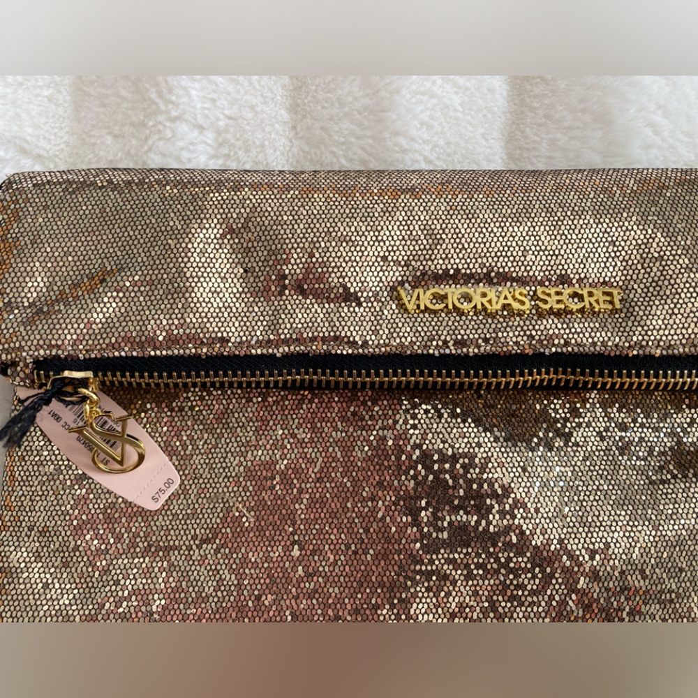 NWT. Victorias Secret gold glitter zipper pouch 10”x12”.